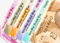 India Polymer Currency Notes showing newly designed ₹10 and ₹20 polymer banknotes highlighting durability, water resistance, enhanced security features, and the RBI pilot rollout approved by the Government of India.
