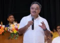 Samik Bhattacharya speaking about West Bengal Industrial Development, emphasizing heavy industries, MSME growth, employment generation, and economic progress at a public event.