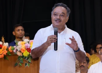Samik Bhattacharya speaking about West Bengal Industrial Development, emphasizing heavy industries, MSME growth, employment generation, and economic progress at a public event.