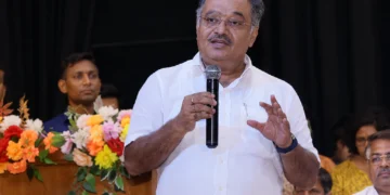 Samik Bhattacharya speaking about West Bengal Industrial Development, emphasizing heavy industries, MSME growth, employment generation, and economic progress at a public event.