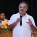 Samik Bhattacharya speaking about West Bengal Industrial Development, emphasizing heavy industries, MSME growth, employment generation, and economic progress at a public event.