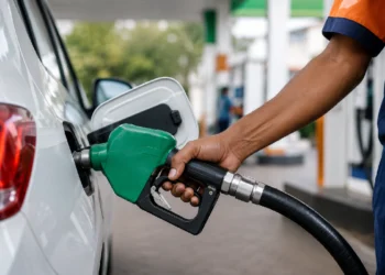 E20 Ethanol Blended Petrol being dispensed at a fuel station in India as motorists refuel their vehicles under the government's ethanol blending initiative.