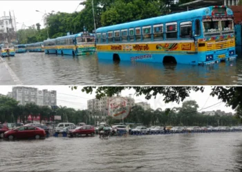 Haldiram More Waterlogging after heavy rainfall showing knee-deep water on the EM Bypass, causing severe traffic congestion and difficulties for commuters and vehicles.