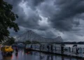 Kolkata Weather Update showing cloudy skies and heavy rain forecast over Kolkata