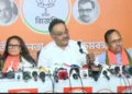 Sushmita Dev BJP candidate with BJP leader Dilip Ghosh discussing the party's stand on former Trinamool leaders joining the BJP in West Bengal politics.