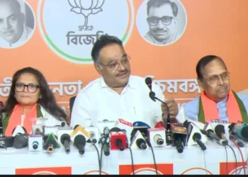 Sushmita Dev BJP candidate with BJP leader Dilip Ghosh discussing the party's stand on former Trinamool leaders joining the BJP in West Bengal politics.