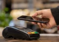UPI MDR Charges update showing QR code digital payment with clarification from Finance Minister Nirmala Sitharaman that customers will not be charged under the current UPI MDR Charges policy.