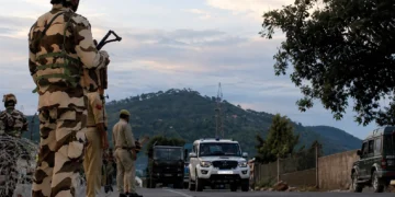 Kulgam Terror Attack scene showing security forces deployed after terrorists opened fire on migrant workers in Jammu and Kashmir, leaving one dead and another critically injured.