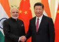 Xi Jinping Delhi Visit during the BRICS summit with India-China flags and diplomatic representation.