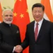 Xi Jinping Delhi Visit during the BRICS summit with India-China flags and diplomatic representation.