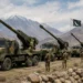 Pakistan SH-15 Howitzers deployed near the India-Pakistan border, showing Chinese-made truck-mounted self-propelled artillery positioned for long-range military operations.