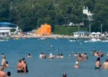Russia Ukraine Drone Attack: Emergency responders and security personnel at a crowded Russian Black Sea beach after a deadly drone strike that reportedly killed seven people and injured dozens.