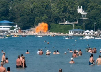 Russia Ukraine Drone Attack: Emergency responders and security personnel at a crowded Russian Black Sea beach after a deadly drone strike that reportedly killed seven people and injured dozens.