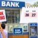 Public sector bank building displaying official notification regarding nationwide bank strike and Sunday working decision.