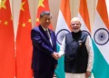 Xi Jinping at the BRICS summit offering China’s mediation to help end the West Asia conflict ছবির বর্ণনা